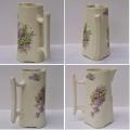 Ancien pichet pot a lait en faience a decor de bouquets de lilas et muguet sur fond blanc casse 1